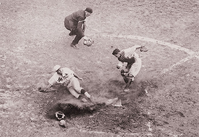 Pepper Martin slides home during 1931 World Series