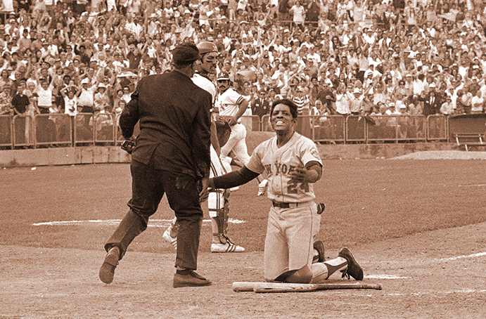 Yogi Berra arguing with umpire over his safe call in the 1st