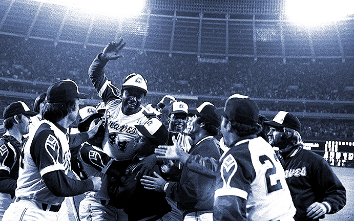 Hank Aaron celebrates his 715th career home run