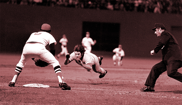 Pete Roses slides head first into third base during 1975 World Series