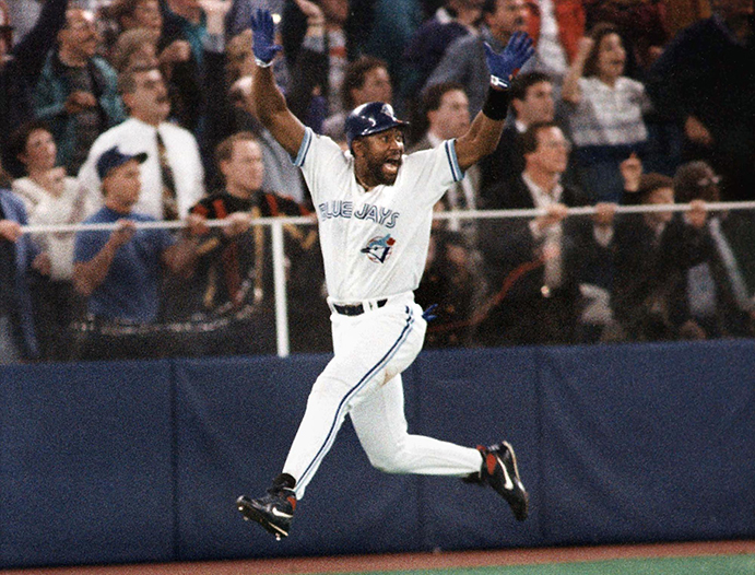 Joe Carter reacts to his 1993 World Series-winning HR