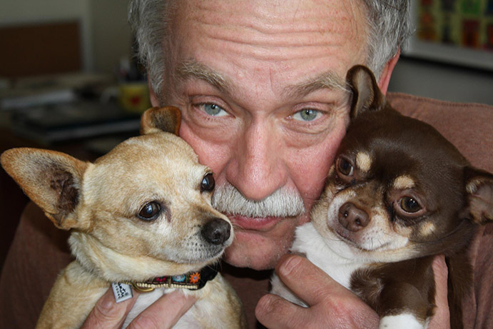Ed Attanasio posing with dogs