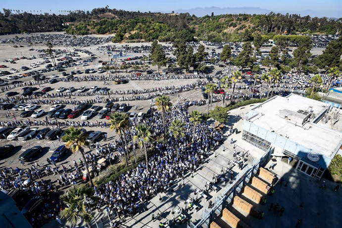 Dodgers fans await in a miles-long line to receive a Shohei Ohtani bobblehead