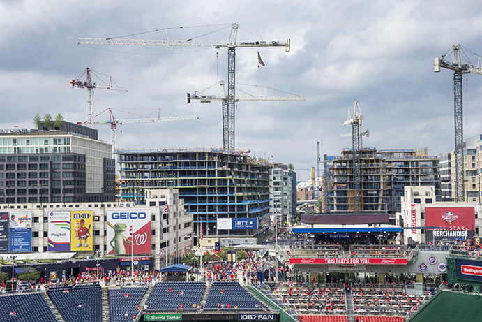 Cranes building hi-rise developments behind Nationals Park